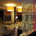 Пузырьковая колоннада из труб диаметром 60мм.  Холл отеля "Парк Инн", г. Ижевск